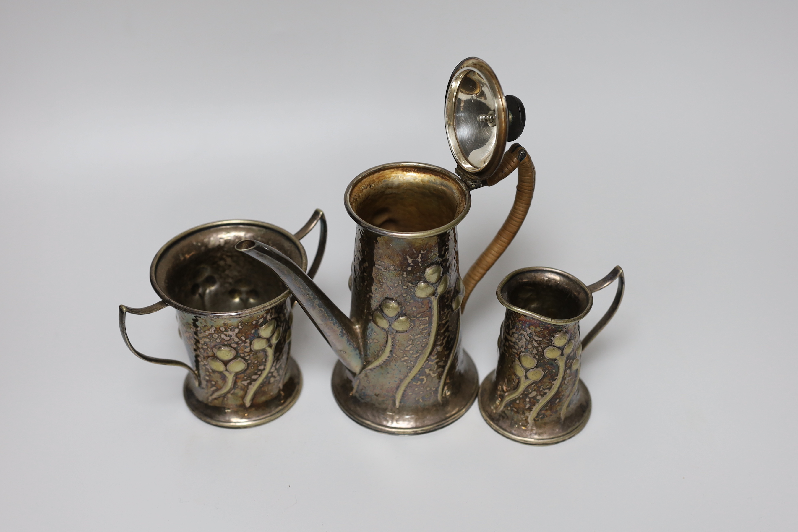 A Mappin and Webb Art Nouveau plated three piece coffee set